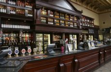 12468974 - edinburgh, uk - july 24, 2010: inside view of a public house, known as pub, for drinking and socializing, is the focal point of the community, pub business, now about 53,500 pubs in the uk, has been declining every year.